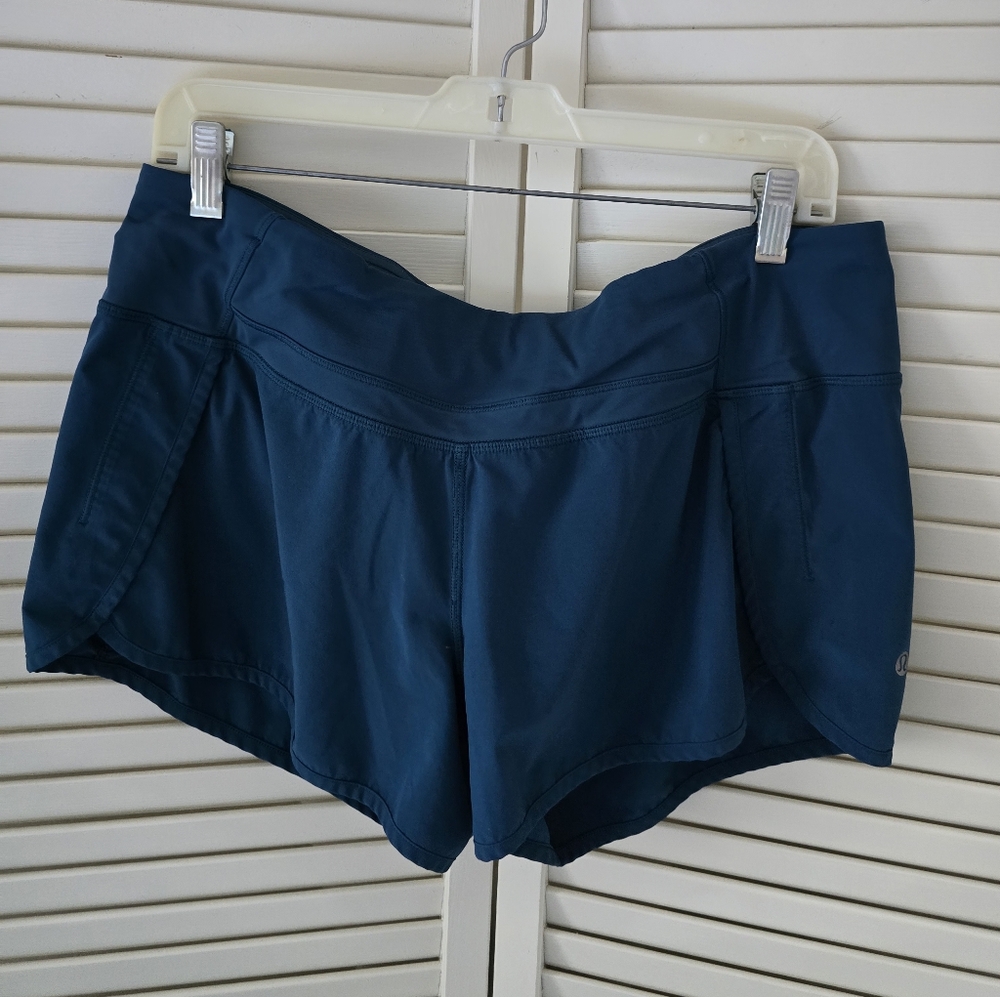 2 pairs Lululemon Women’s Performance Running Shorts - Deep Teal And Navy.